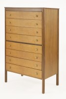 Lot 468 - A teak two-colour eight-drawer chest