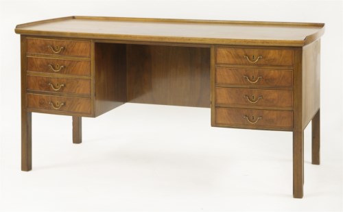 Lot 417 - A Danish walnut desk