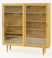 Lot 511 - A Danish light oak glazed bookcase