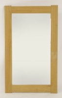 Lot 515 - An oak mirror