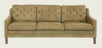 Lot 521 - A Danish leather three-seater settee