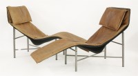 Lot 534 - A pair of tan leather and tubular-framed 'Skye' loungers