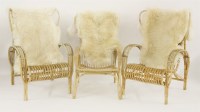 Lot 622 - A set of three wicker armchairs