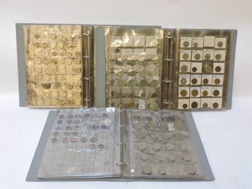 Lot 70 - Three albums of world coins