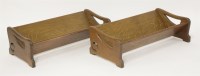 Lot 605 - A pair of oak book racks