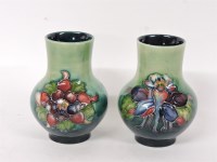 Lot 395 - A pair of Moorcroft vases