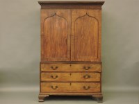 Lot 875 - A 19th century mahogany press cupboard