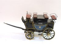 Lot 416 - A painted metal stage coach