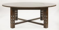 Lot 812 - A Cassina oak dining table