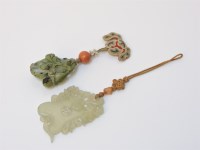 Lot 280 - A Chinese carved jade pendant