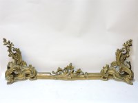 Lot 622 - A French Rococo cast brass adjustable fender