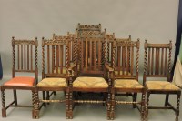 Lot 749 - Eleven 20th century carved oak dining chairs