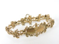 Lot 232 - A 9ct gold identity bracelet