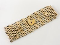 Lot 248A - A 9ct gold ten row gate bracelet