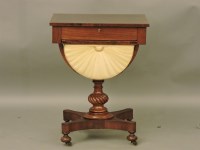 Lot 811 - A Regency mahogany work table