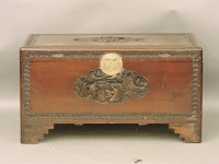 Lot 879 - A carved camphor wood blanket box