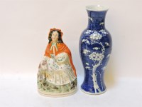 Lot 635 - A Victorian Staffordshire figure