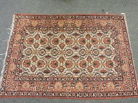 Lot 797 - A pair of cream ground Persian rugs