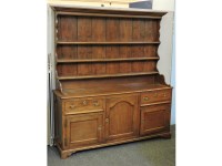 Lot 816 - A George III style oak dresser