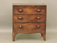 Lot 828 - A small George III mahogany chest