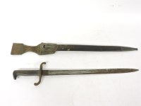 Lot 419 - A German M1871 bayonet with brass hilt and with leather scabbard. (rusty blade) 64cm long