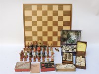 Lot 576 - A hand carved and painted wood Indian chess set