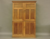 Lot 727 - An oak schools cupboard