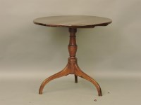 Lot 751 - A 19th century mahogany tripod table