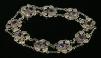 Lot 11 - A sterling silver Arts and Crafts amethyst bracelet
