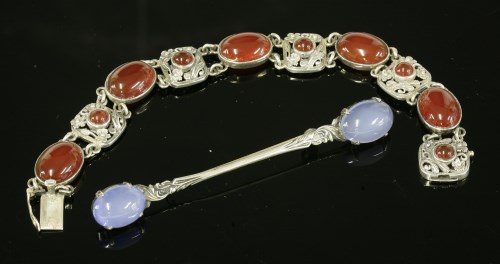 Lot 12 - A sterling silver Arts & Crafts-style cornelian bracelet