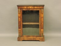 Lot 826 - A Victorian walnut pier cabinet