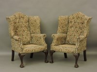 Lot 877 - A pair of 1930s wing chairs