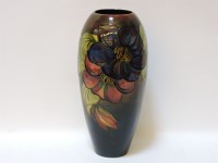 Lot 468 - Moorcroft large flambe clematis pottery vase 37cm high