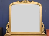 Lot 848 - A modern gilt wood overmantel mirror