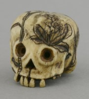 Lot 364 - A rare bone Memento Mori Netsuke