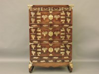 Lot 509 - A Chinese elm and brass mounted cupboard