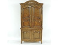 Lot 559 - A modern French style oak armoire