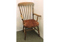 Lot 832 - A Victorian stick back Windsor elbow chair