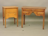 Lot 859 - An early 20th century golden oak work table