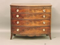 Lot 858 - A George III bow fronted mahogany dressing chest