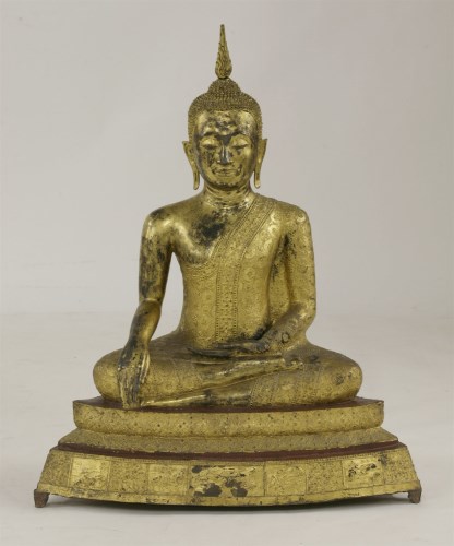 Lot 4 - A gilt bronze Buddha