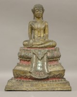 Lot 7 - A gilt bronze Buddha