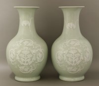 Lot 60 - A pair of pale celadon Vases