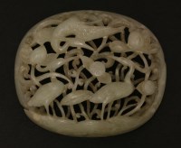 Lot 143 - A carved and pierced jade Appliqué