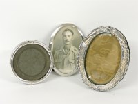 Lot 1075 - Three silver photograph frames
