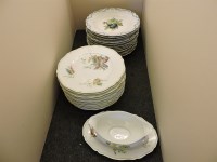 Lot 1238A - Ceramics: A set of twelve Meissen fruit plates (26cm diam) and twelve Limoges Haviland 'Calanque' plates and a sauce boat