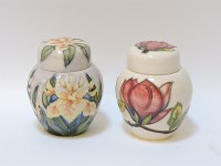Lot 1201 - Two Moorcroft ginger jars and covers