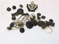 Lot 1091 - A small collection of military badges and buttons