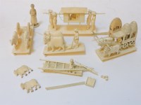 Lot 1120 - A group of late 19th century Indian carved ivory figures