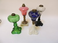 Lot 1209 - Four Victorian oil lamp bases